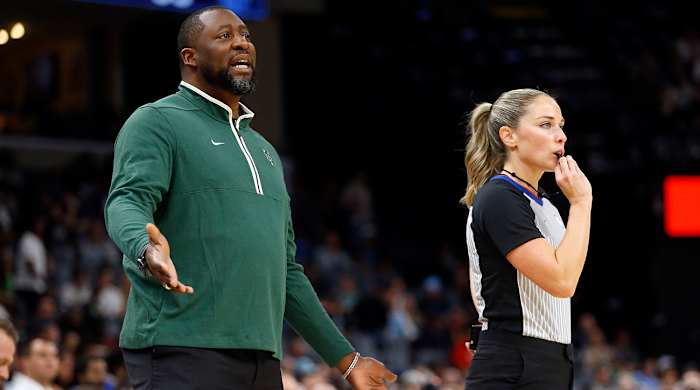 Bucks’ Adrian Griffin talks to his players during NBA preseason.